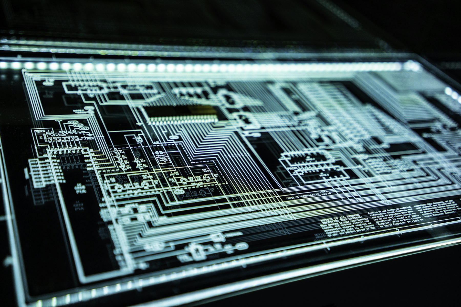 A circuit board lit in blue